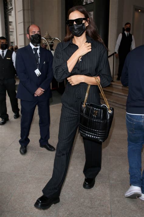 Irina Shayk Wears a Plunging Black Burberry Jumpsuit After Trip 